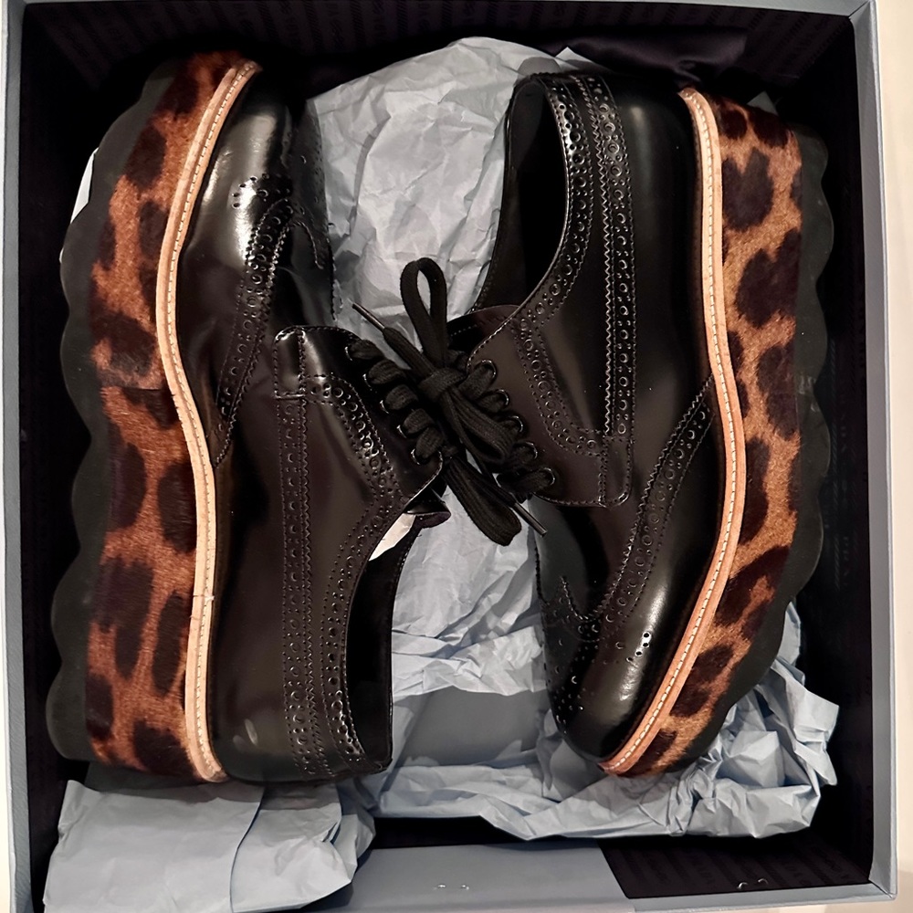 Prada black broque leather & leopard print calf hair lace up platform shoe. 38.5